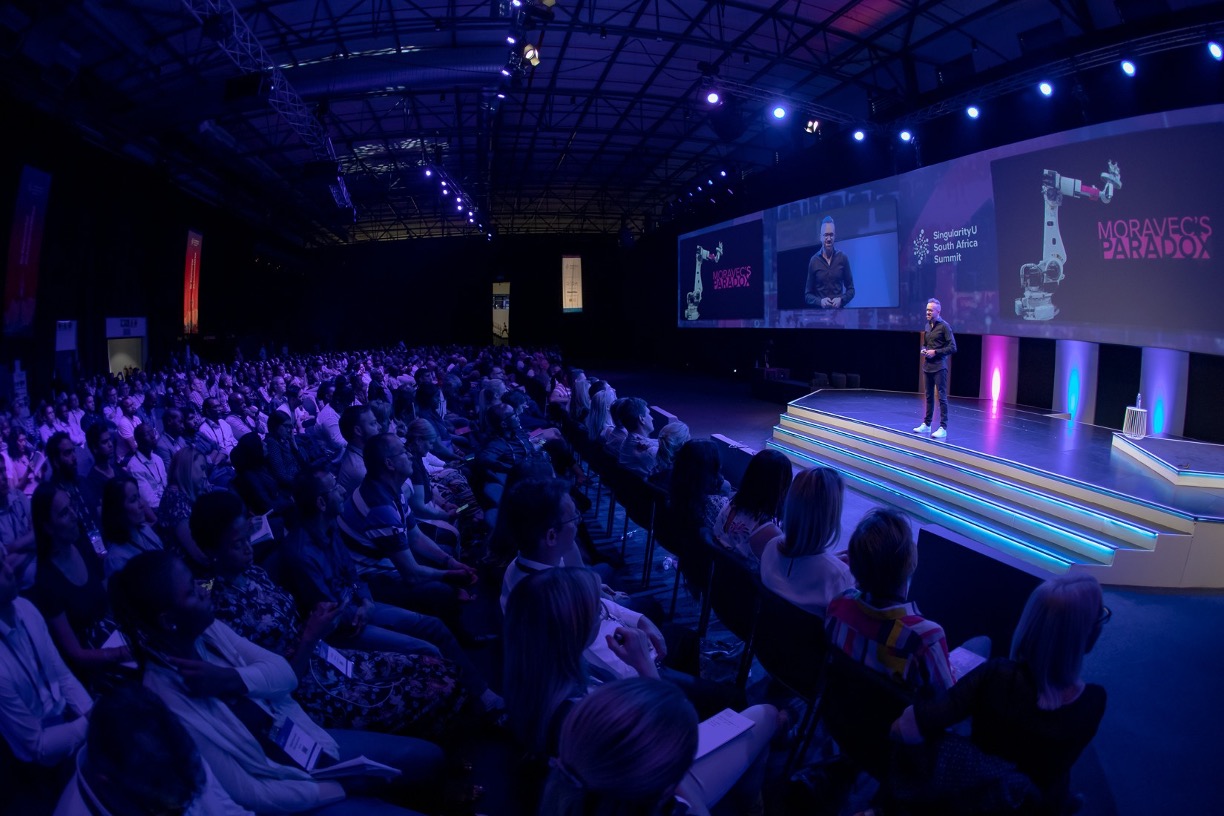 Adam Pantanowitz delivering keynote presentation at a corporate conference